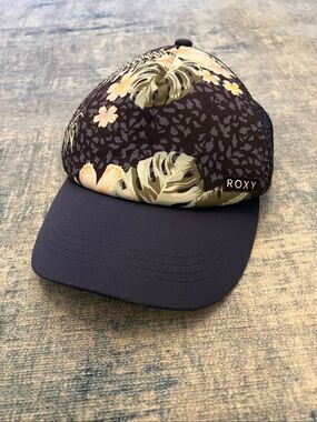 Roxy Girls' Honey Coconut Trucker Cap in the colorway Mood Indigo Animalia